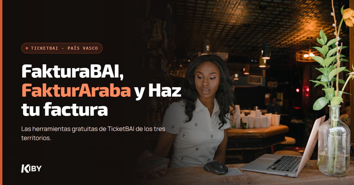 Mujer trabajando con su portátil en un restaurante, con el título FakturaBAI, FakturAraba y Haz tu factura